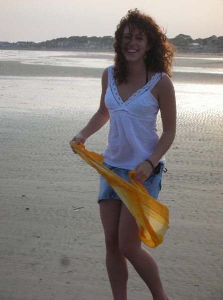 Heather at the beach prior to sexual assault, happy.